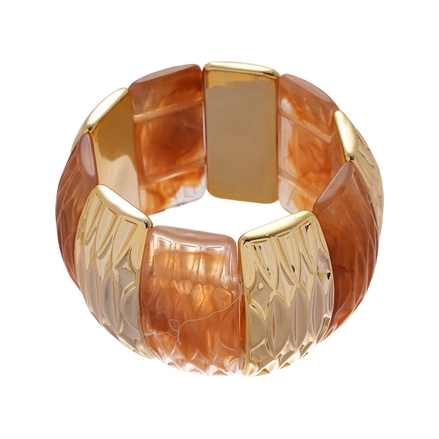 Faceted slim amber resin bangle with citrine-like sparkle