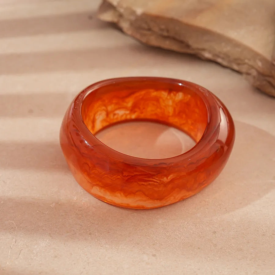 Chunky irregular square amber resin bangle with sculptural edges