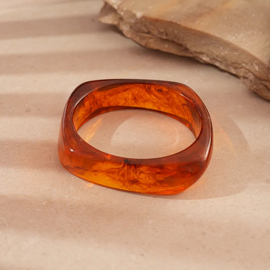 From a sculptural geo bangle to a slip-on halo and an easy open cuff, Honeyglass brings warm, honeyed tones to every wrist layer.

