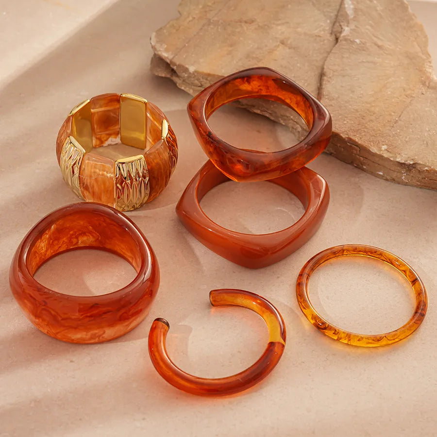 Open amber resin C-cuff with rounded ends, easy slip-on