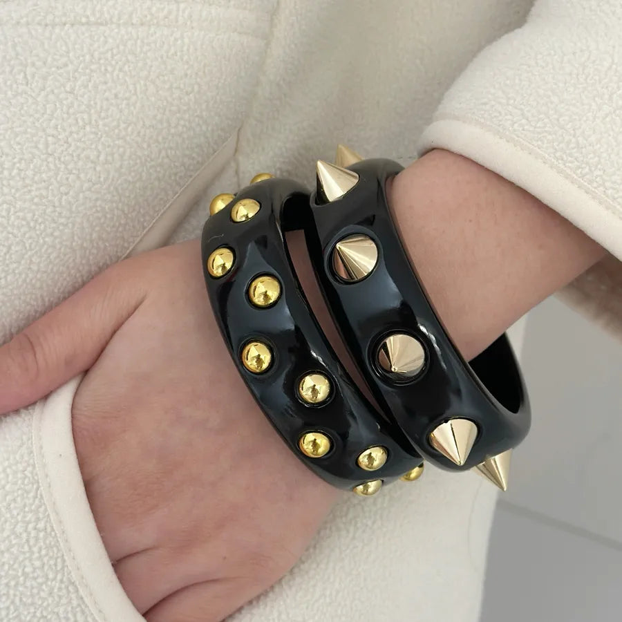 SpikeMuse black resin bangle set – gold dome and spike studded bangles – edgy stack by Layers Store UK