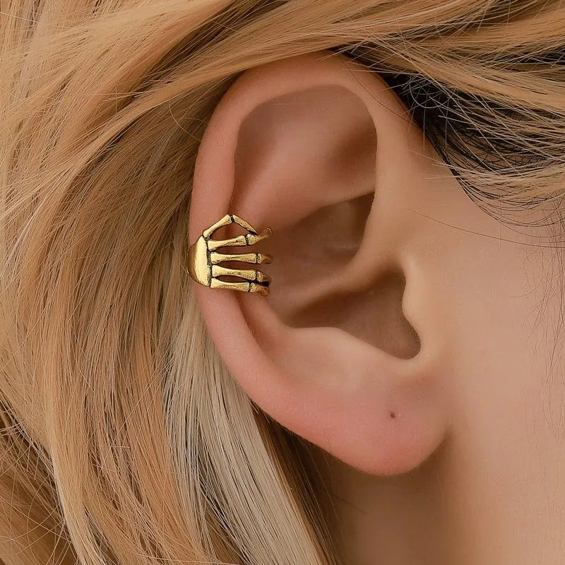 Bone Hug skeleton hand ear cuff – gold Halloween cartilage cuff with bone design – no piercing needed – Layers Store UK