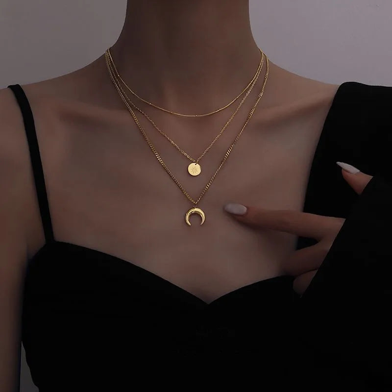 Lunara Layered Necklace – Crescent moon and gold coin charms on triple chain – Layers Store UK Celestial Jewellery