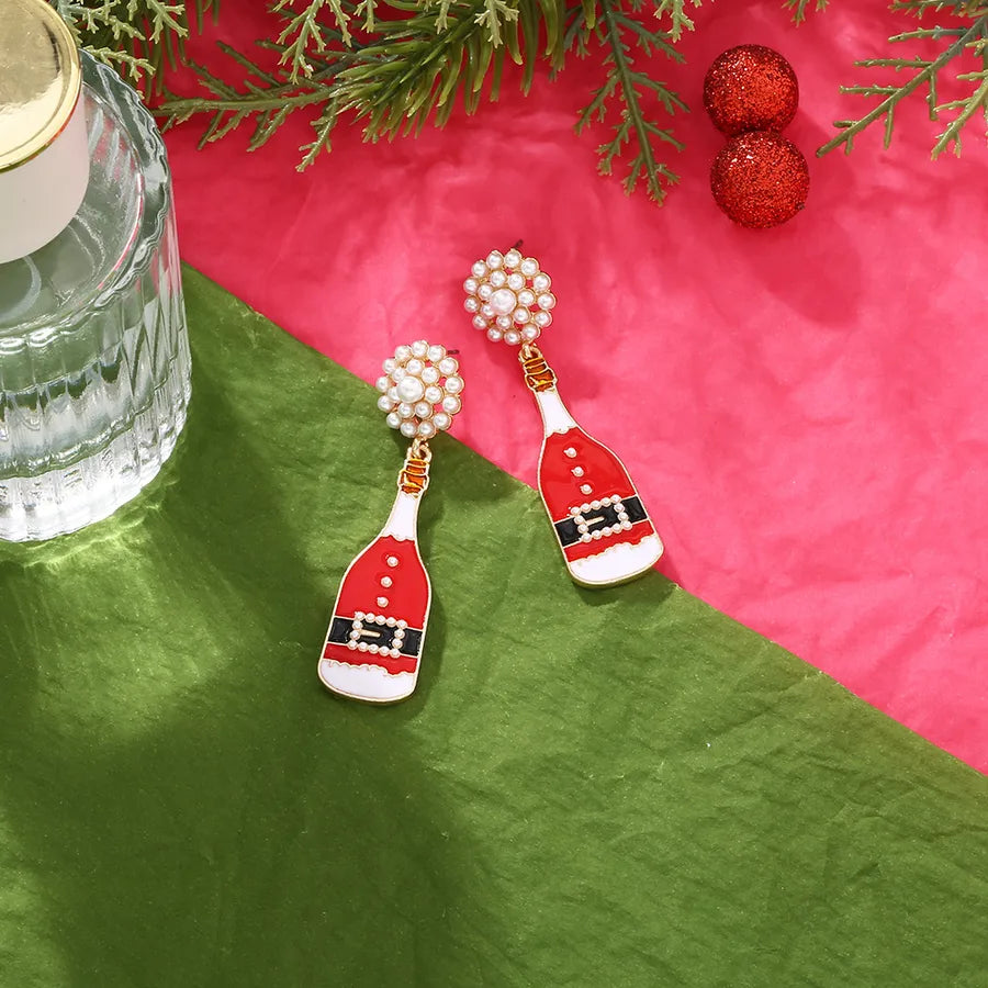 Christmas earrings, Santa champagne earrings, festive drop earrings, holiday jewelry, pearl top earrings, champagne bottle earrings, quirky Christmas accessories, party glam earrings