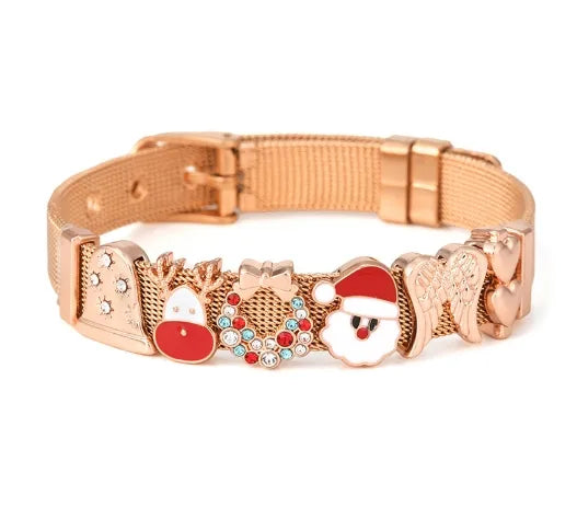 Rose gold mesh bracelet with Christmas-themed charms including Santa, reindeer, wreath, angel wings, and hearts.