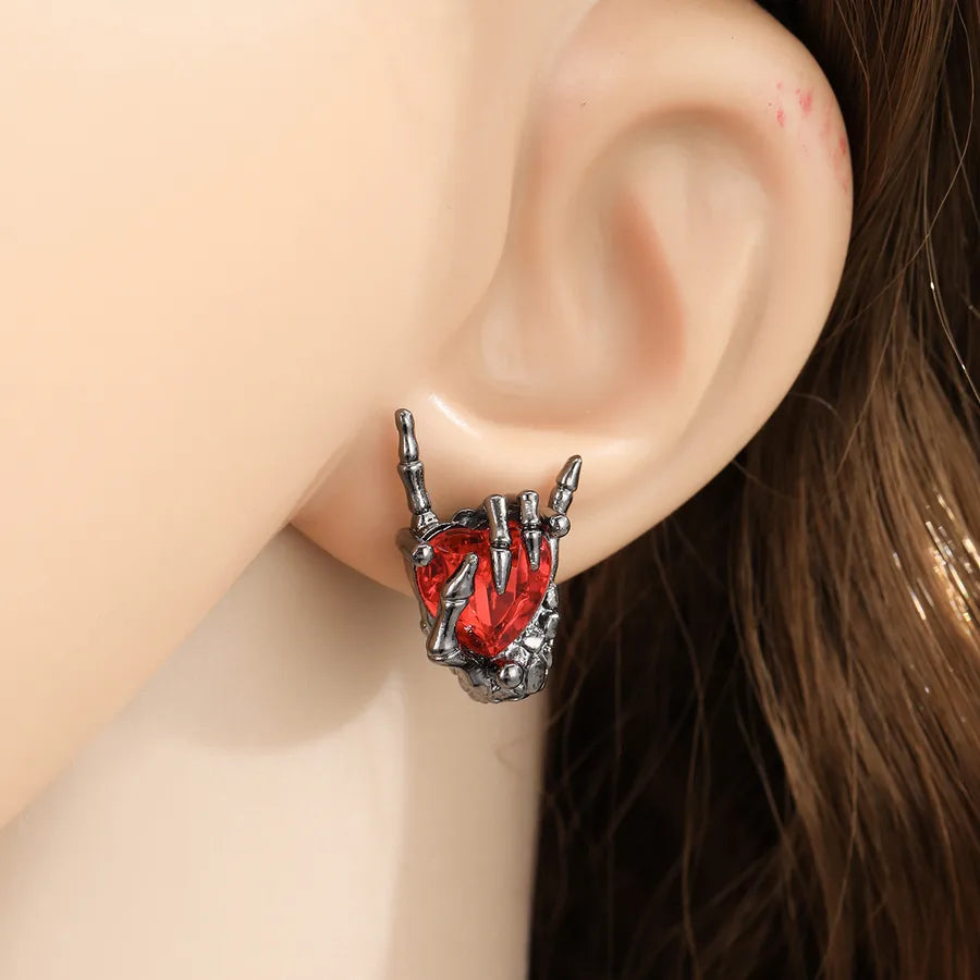 HeartSnatch jewellery set – red crystal heart in skeleton hands earrings and necklace – gothic Halloween jewellery – Layers Store UK