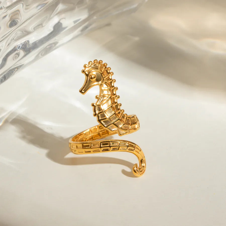 Discover The Layers’ Golden Tide Seahorse Ring — an adjustable gold-plated ocean-inspired statement ring. Perfect for beach lovers and everyday elegance. Shop now!