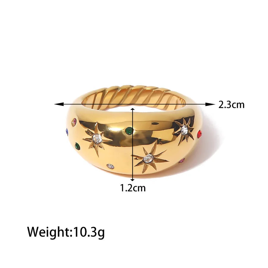 Gold and silver chunky sculptural rings stacked on hands, featuring metallic finish from The Layers jewellery collection.